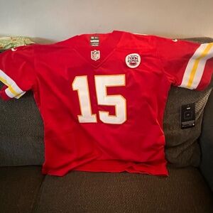 Brand New Women’s size Large KC Jersey.